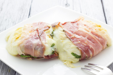 Tomino cheese with bacon
