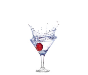 Strawberries, ice cubes into the glass
