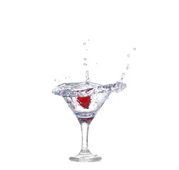 Strawberries, ice cubes into the glass