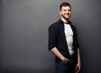 Obraz premium Portrait of young handsome man in t-shirt.