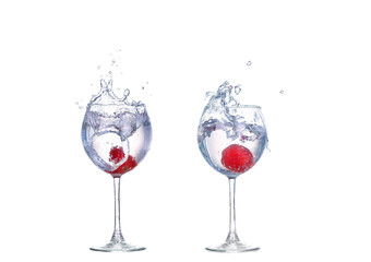 Strawberries, ice cubes into the glass