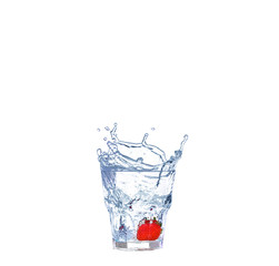 Strawberries, ice cubes into the glass