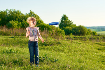Girl playing frisbee in the park