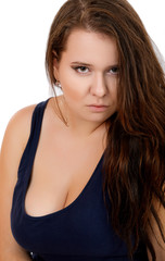 Fototapeta premium stern look fat girl on a white background