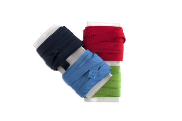 Reeled colored cotton tapes