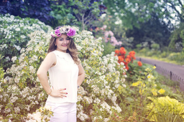 Beautiful girl outdoors in spring park