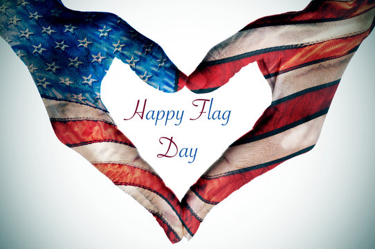 hands forming a heart patterned as the flag of the United States