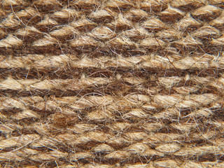 Rough knit camel wool fabric texture pattern.