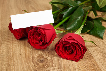 Red rose flower on wood