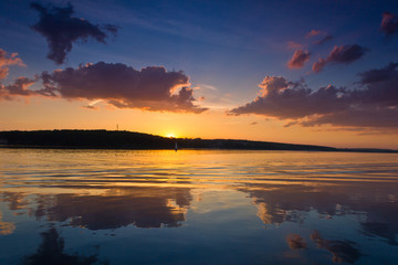 Fototapeta na wymiar Nice landscape with sunset on lake.