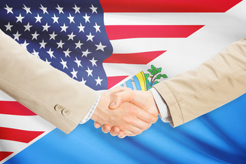 Businessmen handshake - United States and San Marino