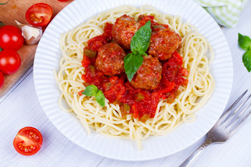 Spaghetti with meatballs in tomato sauce