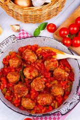 Meatballs with tomato sauce in a pan