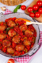 Meatballs with tomato sauce in a pan
