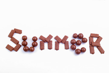 Chocolate candies on a white background.