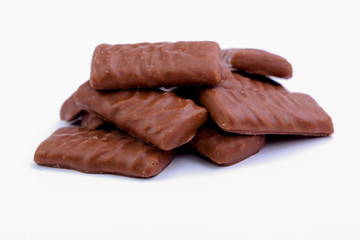Chocolate candies on a white background.