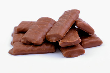 Chocolate candies on a white background.