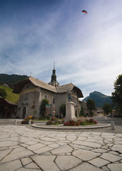 Beautiful church in the French Alpine Town of Morzine. - obrazy, fototapety, plakaty