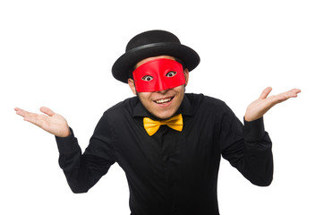 Young man in black costume and red mask isolated on white