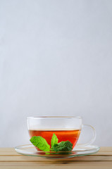 Lemon Tea in Glass Cup with Mint Sprig