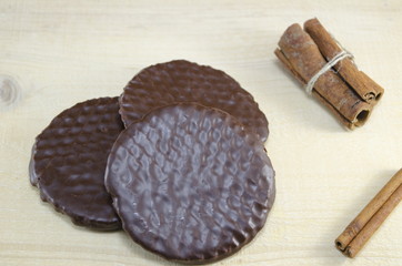 Chocolate biscuits with cinnamon sticks