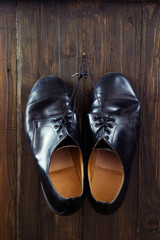 Black shoes  on wooden background