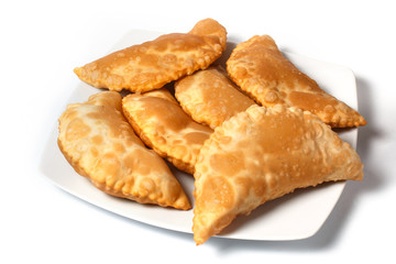 pasties on white plate