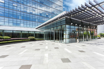 Empty road near modern building