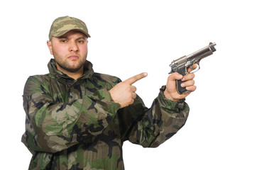 Young man in soldier uniform holding gun isolated on white