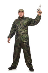 Young man in soldier uniform holding gun isolated on white