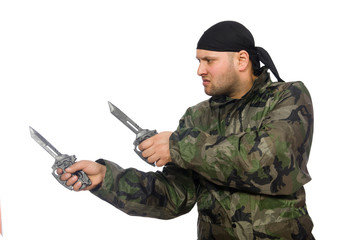 Young man in soldier uniform holding knife isolated on white