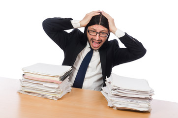 Businessman overwhelmed and stressed from paperwork