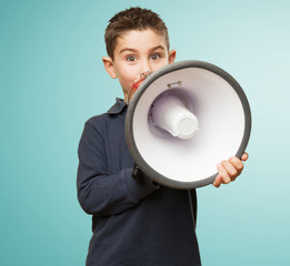 little kid holding a megaphone