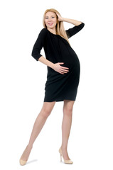 Pretty pregnant woman in mini black dress isolated on white