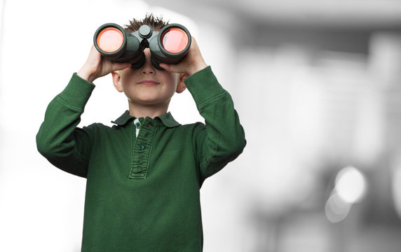 little kid using binoculars