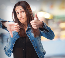 woman doing contradictory gesture