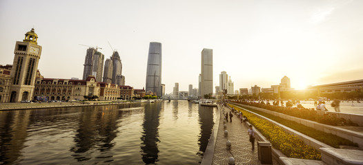 modern buildings at riverbank