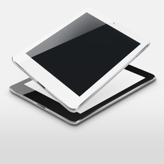 Tablet computers with blank and black screens.
