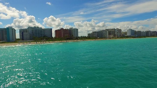 Aerial drone video Miami Beach from ocean to land