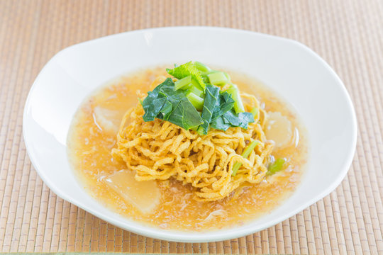 Pan fried noodles with pork.
