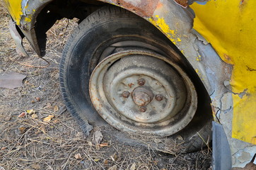 Detail Shot of a Flat Tire on a Car Selection Focus on Tire