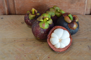 mangosteen preel out on wooden board