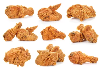  Golden brown fried chicken on white background. © nipaporn
