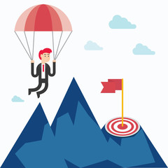 Businessman landing on a target with a parachute