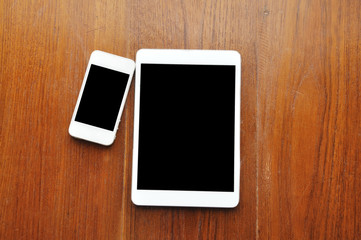 Cell phone On Wooden Background.