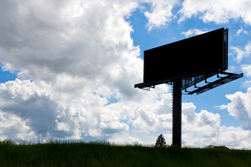 empty billboard in the landscape against the sky
