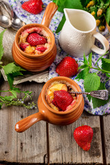Dessert with cottage cheese and strawberry.
