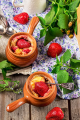 Dessert with cottage cheese and strawberry.
