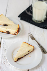 Homemade raisins cheescake with glass of milk
