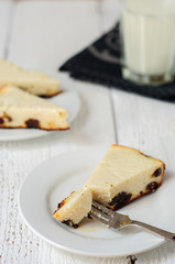 Homemade raisins cheescake with glass of milk